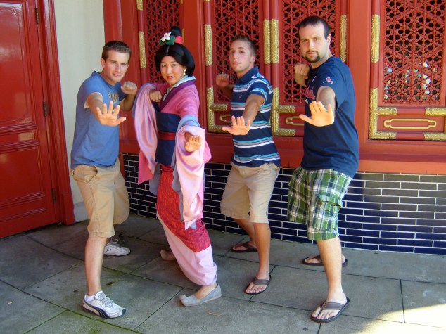 Posing like warriors with Mulan and our friend David