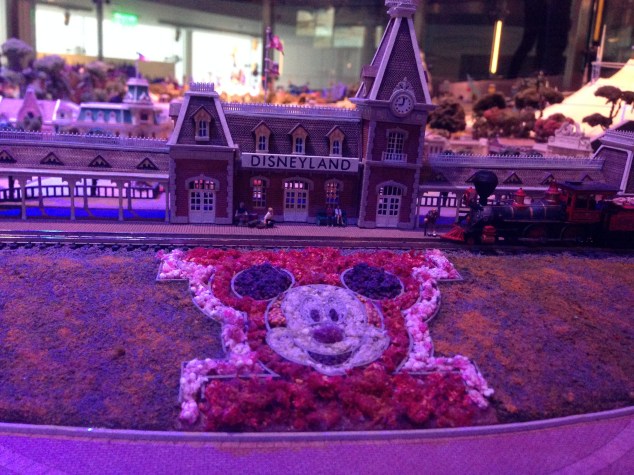 A scale model of Disneyland featuring both current and extinct attractions throughout the decades